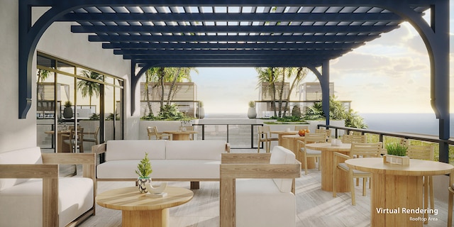 view of patio / terrace featuring a water view, exterior bar, and a pergola