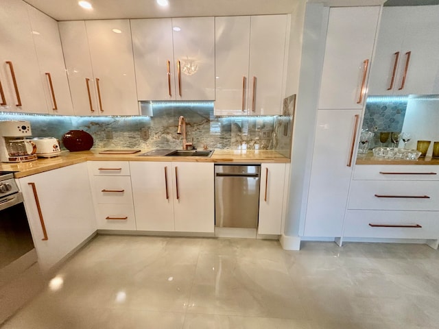 kitchen featuring dishwasher, backsplash, white cabinets, sink, and range