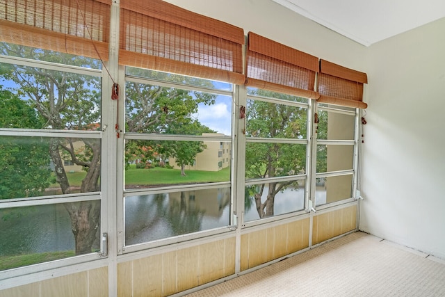 unfurnished sunroom featuring a wealth of natural light