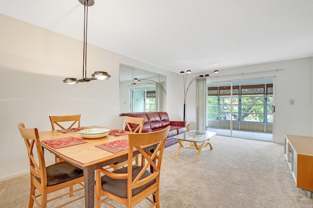 dining space with light carpet