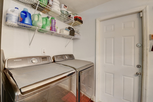 laundry area with separate washer and dryer