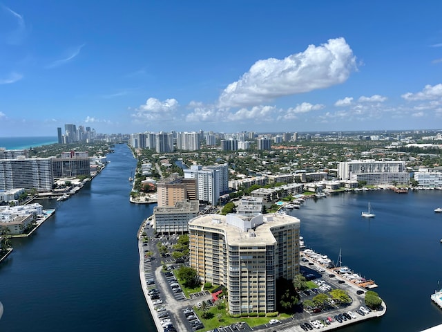 birds eye view of property featuring a water view