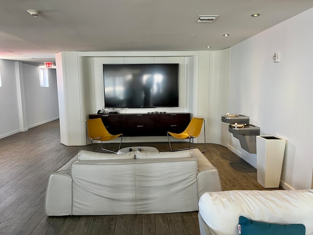 living room with dark wood-type flooring