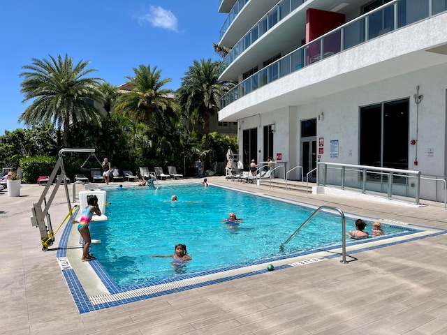 view of pool featuring a patio