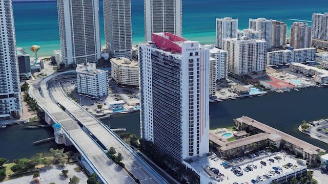 property's view of city featuring a water view