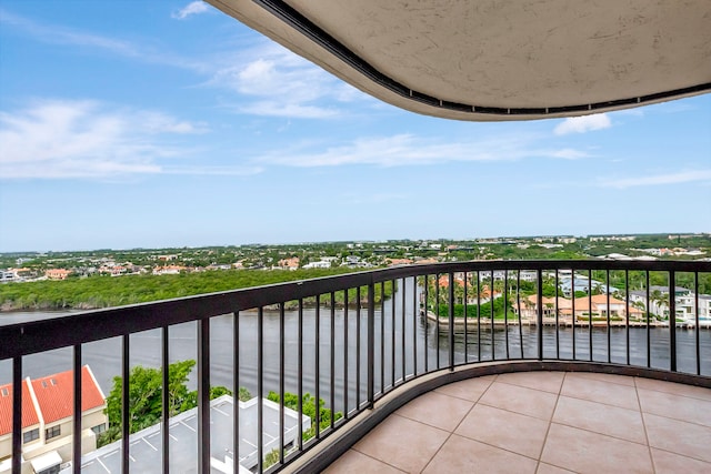 balcony featuring a water view