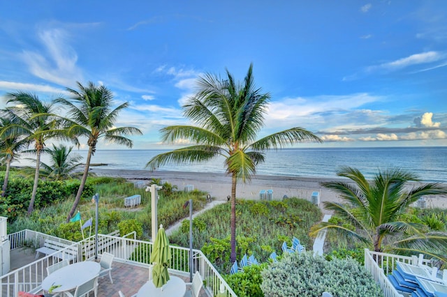 property view of water featuring a beach view