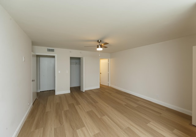 unfurnished bedroom featuring ceiling fan and light hardwood / wood-style flooring