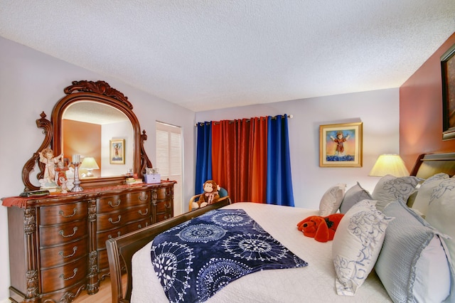 bedroom featuring a textured ceiling