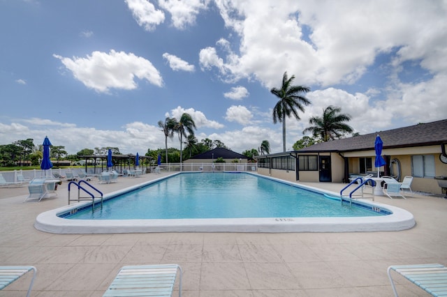 view of swimming pool featuring a patio area