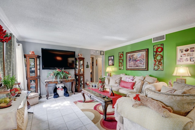 living room with a textured ceiling, light tile flooring, and ornamental molding