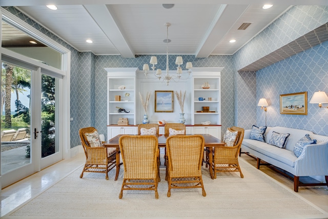 dining area featuring built in shelves, a notable chandelier, french doors, and beamed ceiling