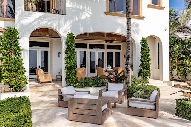 view of patio with ceiling fan and french doors