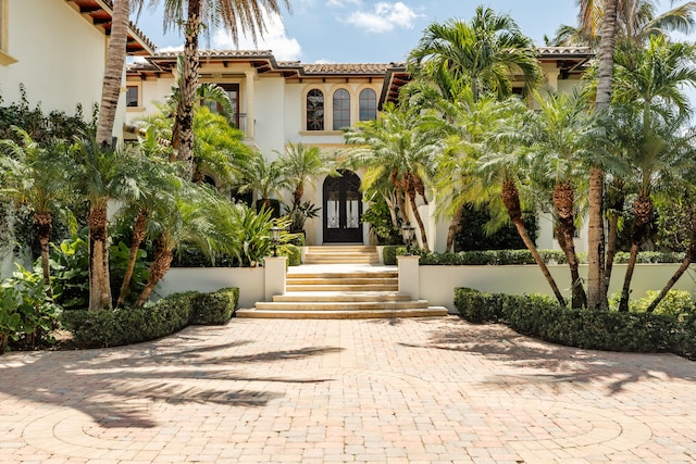 mediterranean / spanish house with french doors