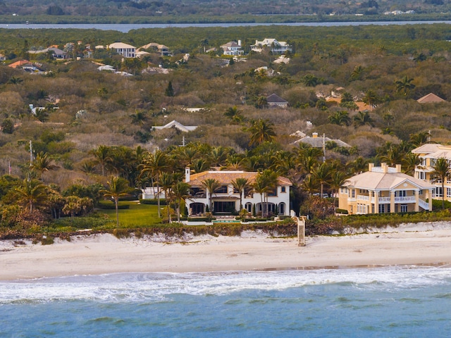 bird's eye view featuring a water view and a view of the beach