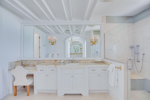 bathroom featuring vanity, beamed ceiling, an inviting chandelier, a tile shower, and tile floors