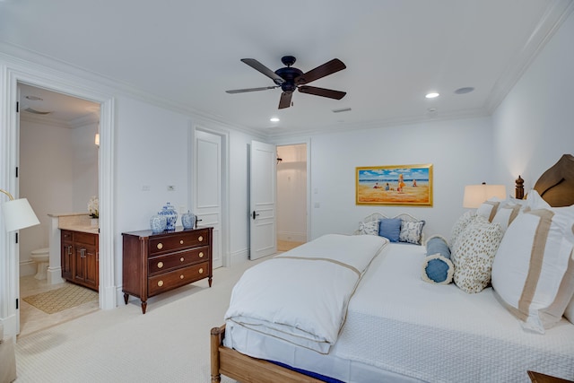 bedroom with light colored carpet, ensuite bathroom, ceiling fan, and crown molding