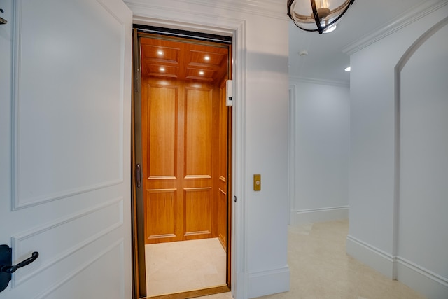 corridor with crown molding and light tile floors