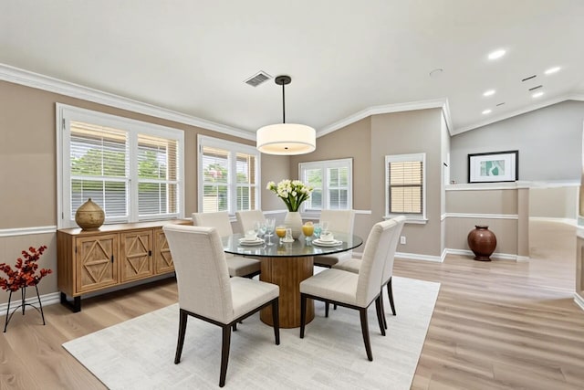 2559 Palm Deer Dr, Loxahatchee, FL 33470 - dining space with light wood-type flooring, crown molding, baseboards, and recessed lighting