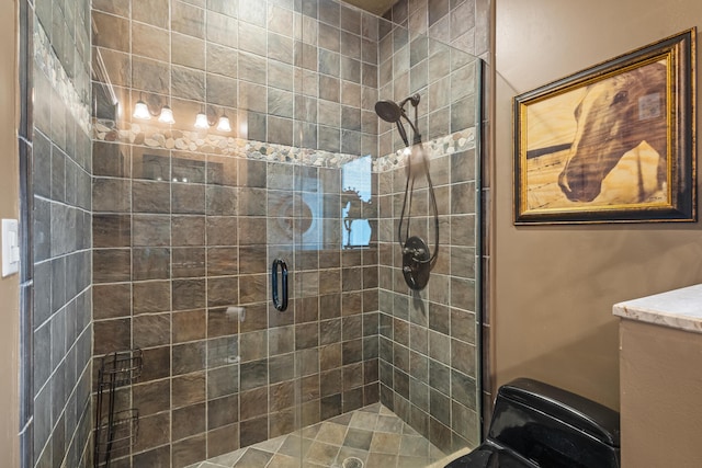 bathroom with a shower with shower door