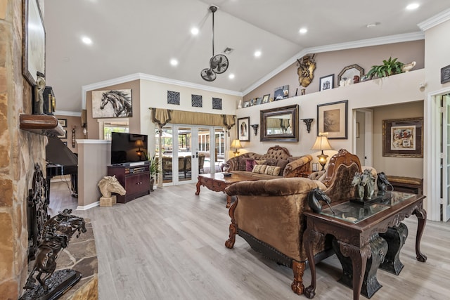 living room with crown molding, french doors, high vaulted ceiling, and light hardwood / wood-style floors