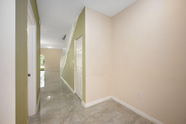 hallway with light tile floors