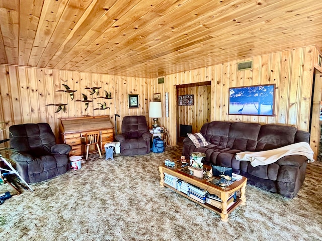 living room with wooden ceiling, wood walls, and carpet