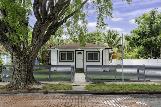 422 49th St, West Palm Beach, FL 33407 - view of front of house with a fenced front yard