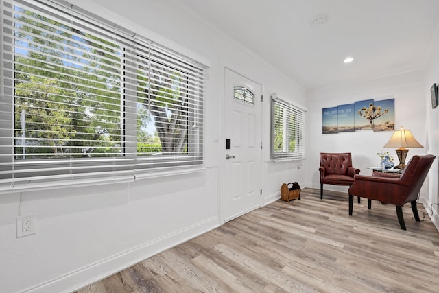 422 49th St, West Palm Beach, FL 33407 - foyer entrance with light wood-type flooring, ornamental molding, baseboards, and recessed lighting