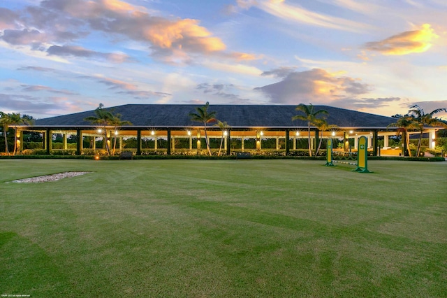 view of home's community with a lawn