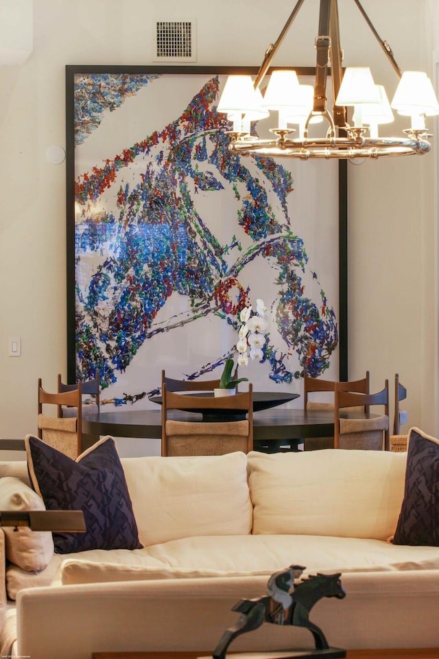 living room featuring an inviting chandelier