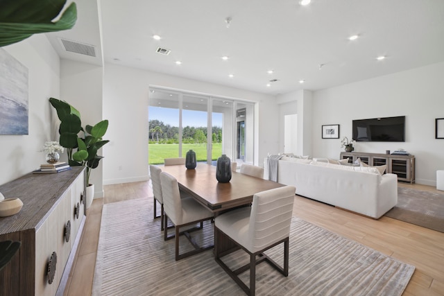 dining room featuring light hardwood / wood-style flooring