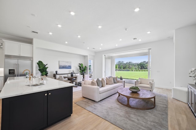 living room with light wood-type flooring