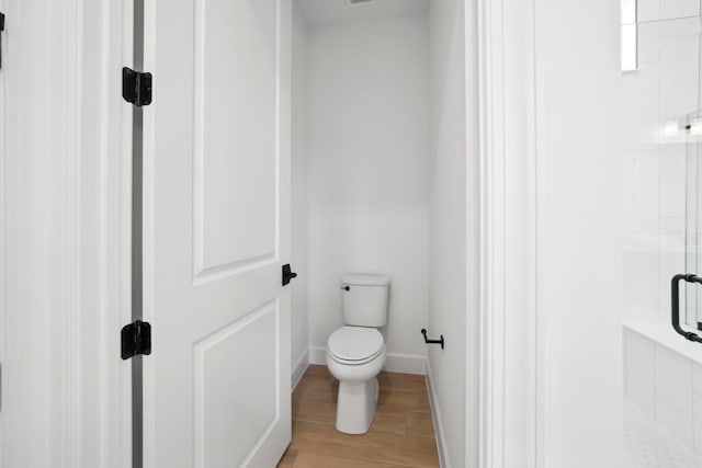 bathroom featuring toilet