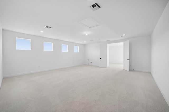 basement with light colored carpet