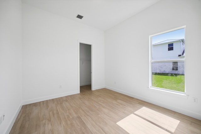 empty room featuring light hardwood / wood-style floors