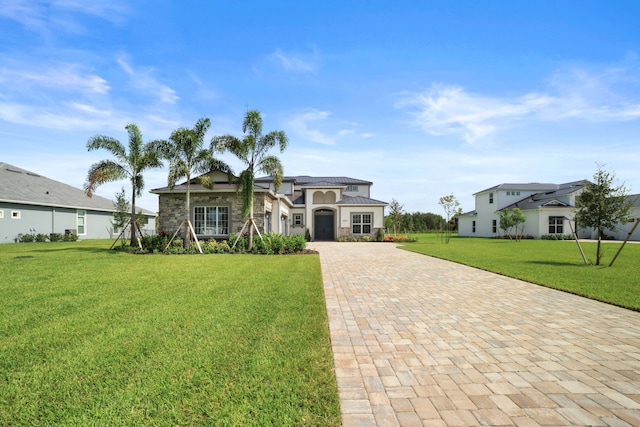 view of front facade with a front yard