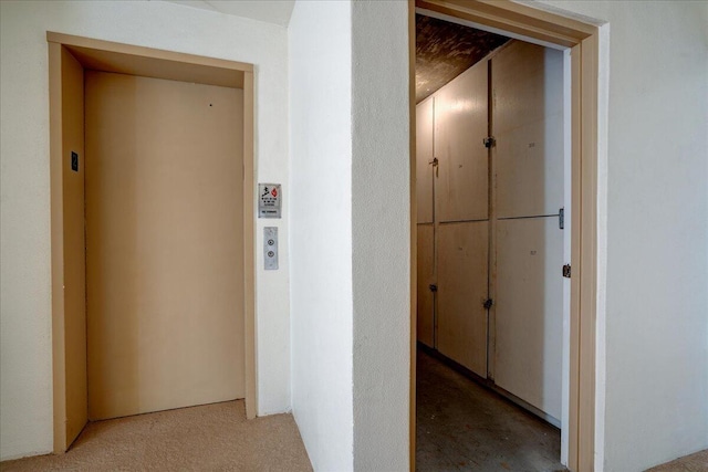 hallway featuring elevator