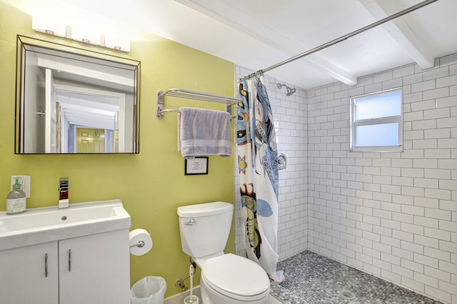 bathroom featuring vanity, beam ceiling, a shower with shower curtain, and toilet