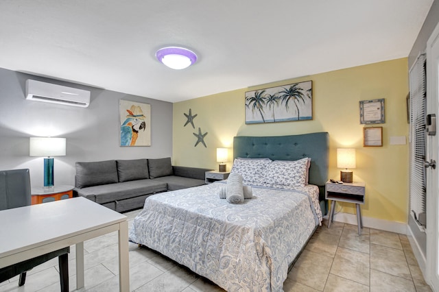 tiled bedroom featuring an AC wall unit