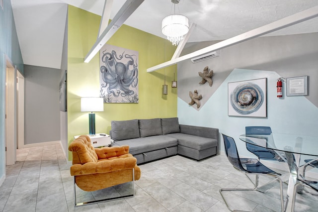 living room featuring light tile floors and an inviting chandelier