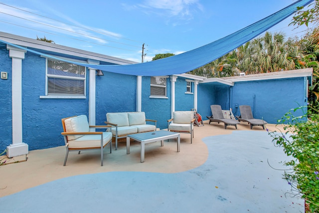 view of patio / terrace with an outdoor hangout area