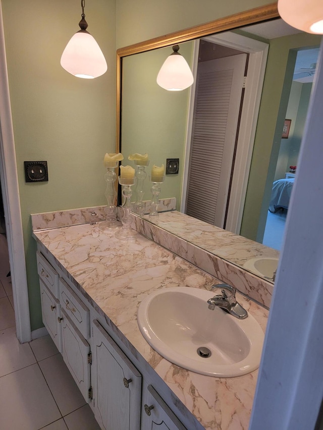 bathroom with vanity and tile patterned floors