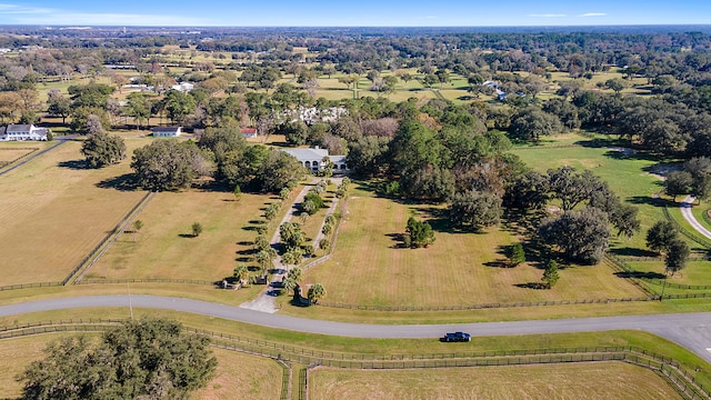 birds eye view of property featuring a rural view