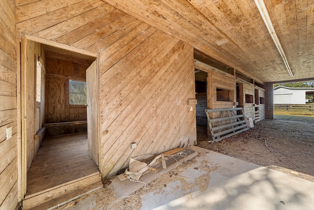 view of horse barn featuring an outdoor structure