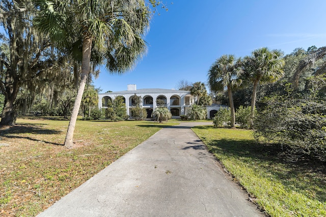 view of front of home with a front lawn