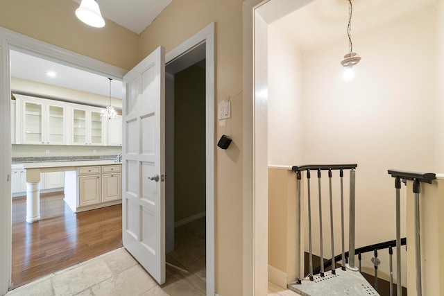 corridor featuring light hardwood / wood-style flooring