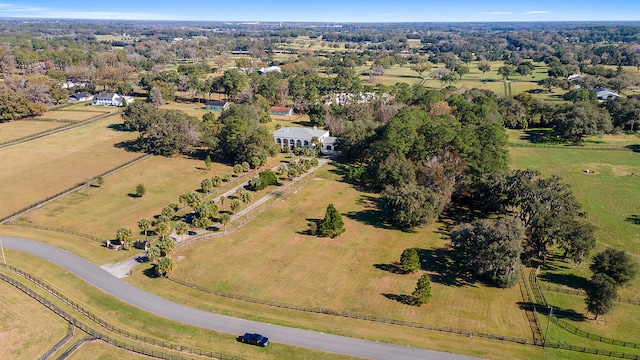 birds eye view of property featuring a rural view