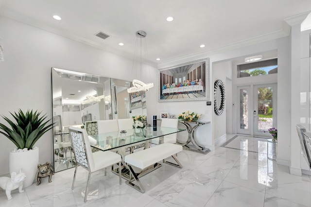 dining area with crown molding, french doors, and light tile floors