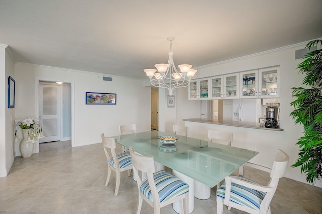 dining space featuring crown molding, an inviting chandelier, and light tile flooring